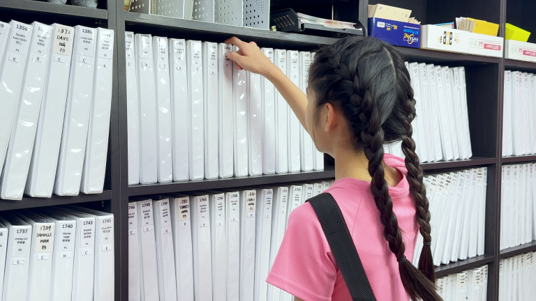 Student collecting learning materials at a MathConcept Centre